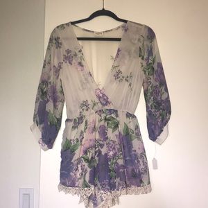 FLORAL PRINT ROMPER (NEVER WORN)
